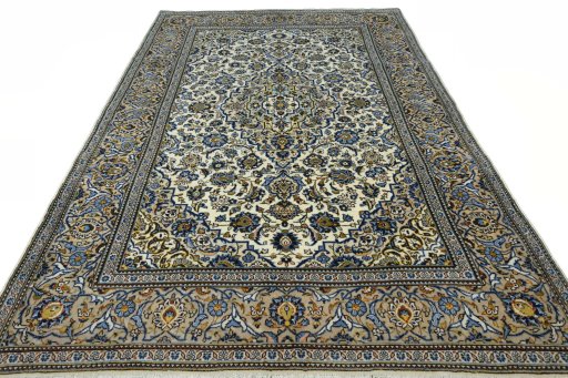 Surface texture of 2000s Kashan rug with natural Wool and intricate pattern