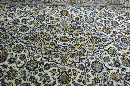 Central medallion detail of 2000s Kashan rug from Iran / Persia