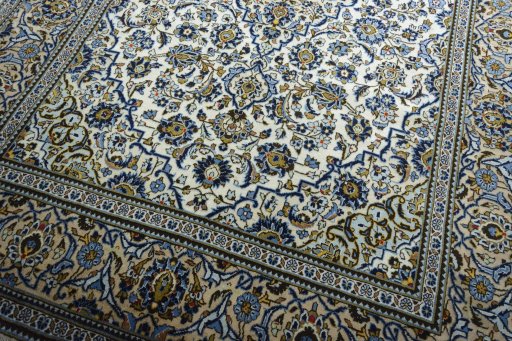 Close-up detail of 2000s Kashan rug from Iran / Persia showing Wool weave
