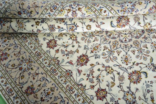 Close-up detail of New Kashan rug from Iran / Persia showing Wool weave