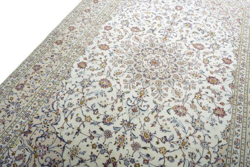 Backside of handmade New Kashan rug showing knot structure and weave density