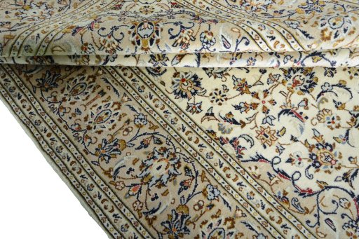 Close-up detail of New Kashan rug from Iran / Persia showing Wool weave