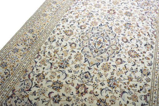 Backside of handmade New Kashan rug showing knot structure and weave density