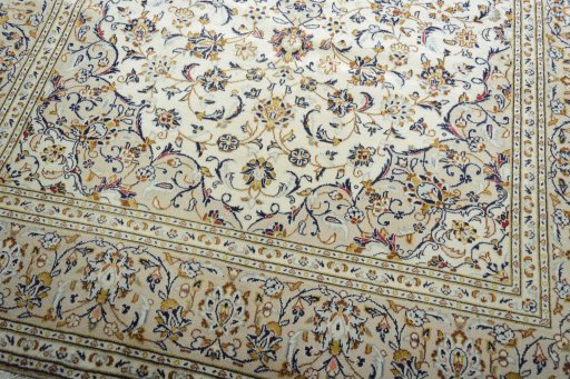 Close-up detail of New Kashan rug from Iran / Persia showing Wool weave