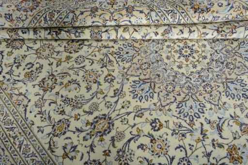 Close-up detail of 2000s Kashan rug from Iran / Persia showing Wool weave