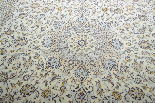 Central medallion detail of 2000s Kashan rug from Iran / Persia