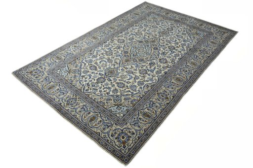 Corner detail of 2000s Kashan rug showing border pattern and Wool pile