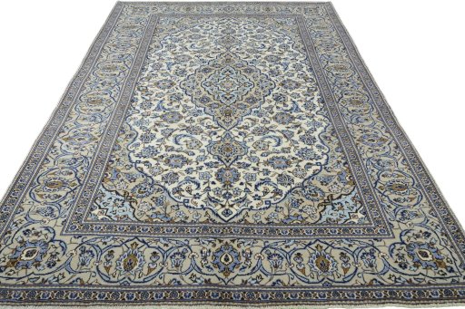 Surface texture of 2000s Kashan rug with natural Wool and intricate pattern