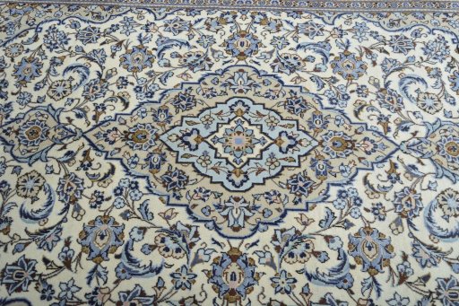 Central medallion detail of 2000s Kashan rug from Iran / Persia