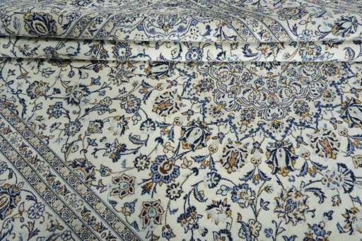 Close-up detail of 2000s Kashan rug from Iran / Persia showing Wool weave