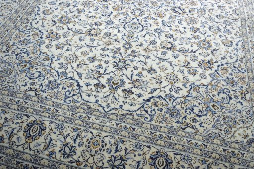 Close-up detail of 2000s Kashan rug from Iran / Persia showing Wool weave