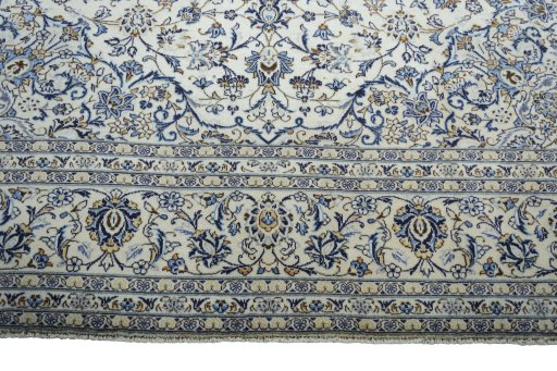 Full view of 2000s Kashan rug from Iran / Persia, 397 × 297 cm in Beige tones