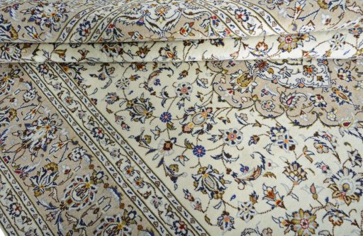 Close-up detail of 2000s Kashan rug from Iran / Persia showing Wool weave
