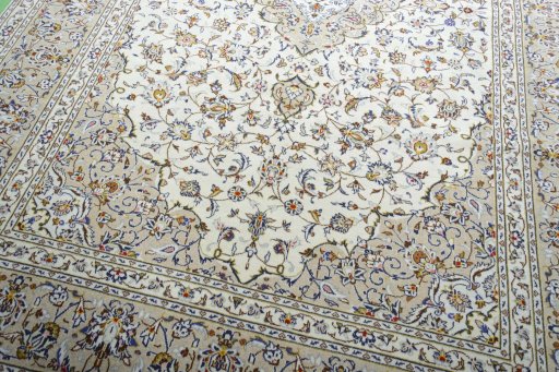 Close-up detail of 2000s Kashan rug from Iran / Persia showing Wool weave