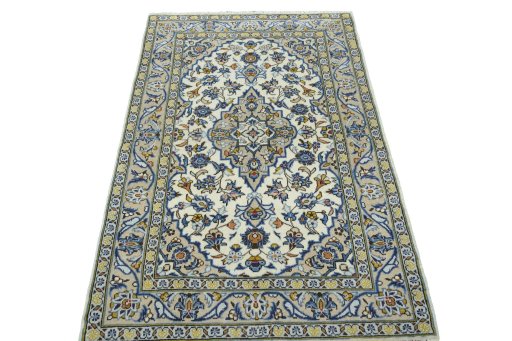 Surface texture of 2000s Kashan rug with natural Wool and intricate pattern