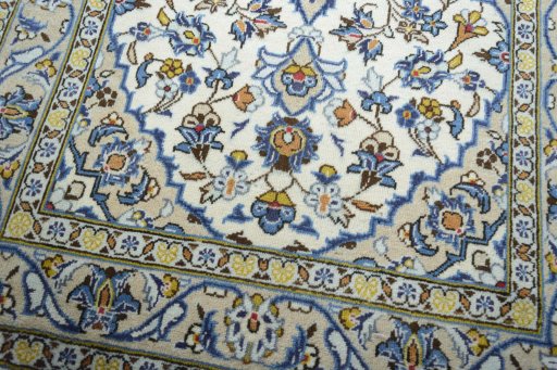 Close-up detail of 2000s Kashan rug from Iran / Persia showing Wool weave