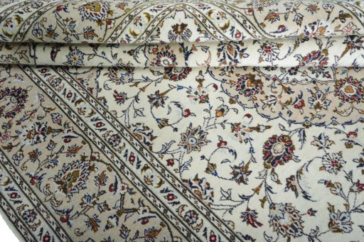 Close-up detail of 2000s Kashan rug from Iran / Persia showing Wool weave