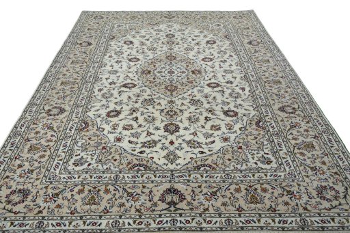 Surface texture of 2000s Kashan rug with natural Wool and intricate pattern