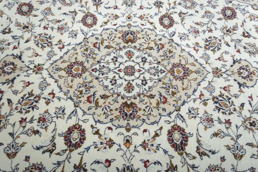 Central medallion detail of 2000s Kashan rug from Iran / Persia