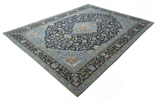 Corner detail of 2000s Kashan rug showing border pattern and Wool pile