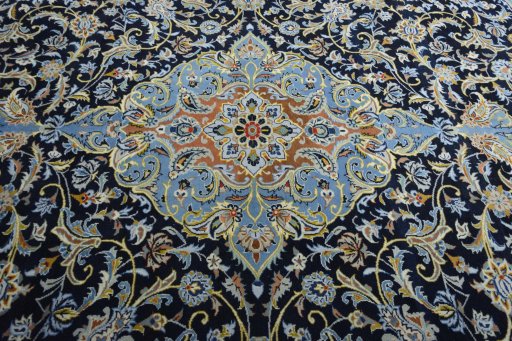 Central medallion detail of 2000s Kashan rug from Iran / Persia