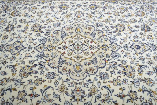 Central medallion detail of 2000s Kashan rug from Iran / Persia
