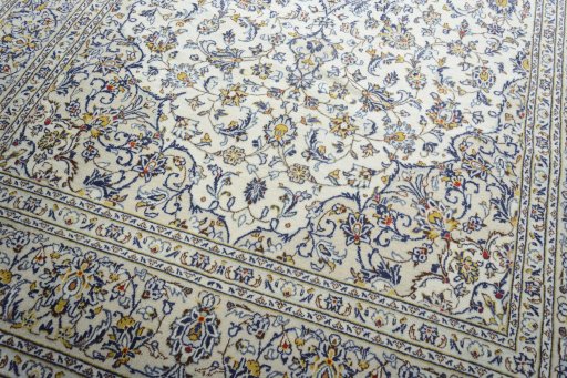 Close-up detail of 2000s Kashan rug from Iran / Persia showing Wool weave