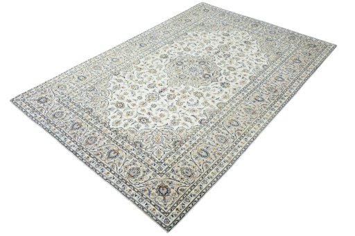 Corner detail of 2000s Kashan rug showing border pattern and Wool pile