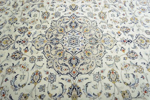 Central medallion detail of 2000s Kashan rug from Iran / Persia