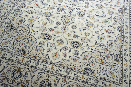 Close-up detail of 2000s Kashan rug from Iran / Persia showing Wool weave