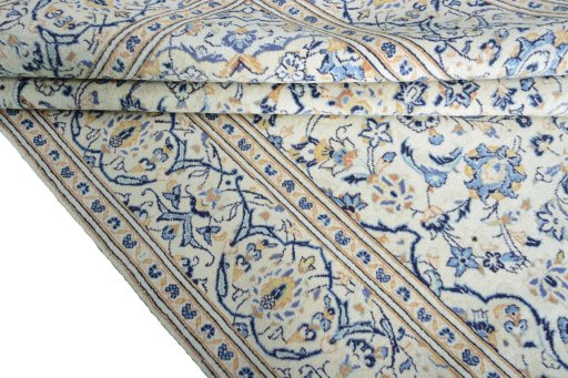 Close-up detail of 2000s Kashan rug from Iran / Persia showing Wool weave