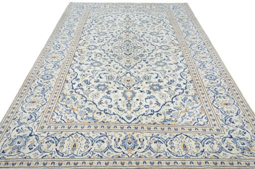 Surface texture of 2000s Kashan rug with natural Wool and intricate pattern