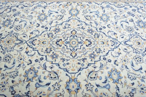 Central medallion detail of 2000s Kashan rug from Iran / Persia
