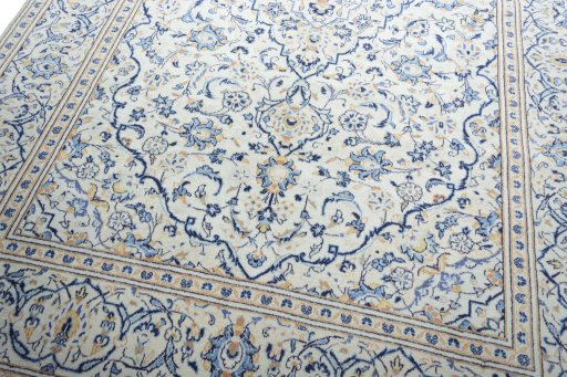 Close-up detail of 2000s Kashan rug from Iran / Persia showing Wool weave