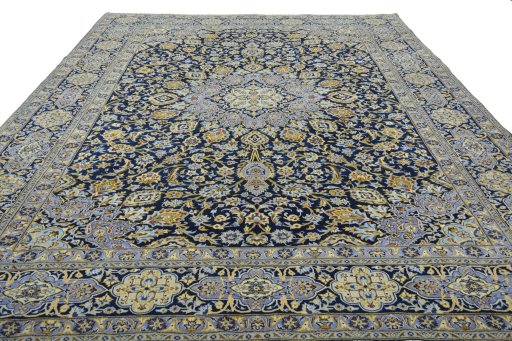 Surface texture of 2000s Kashan rug with natural Wool and intricate pattern
