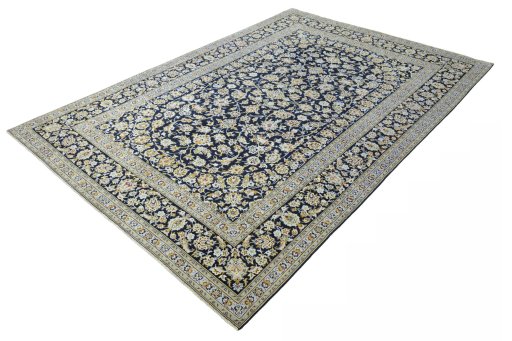Corner detail of 2000s Kashan rug showing border pattern and Wool pile
