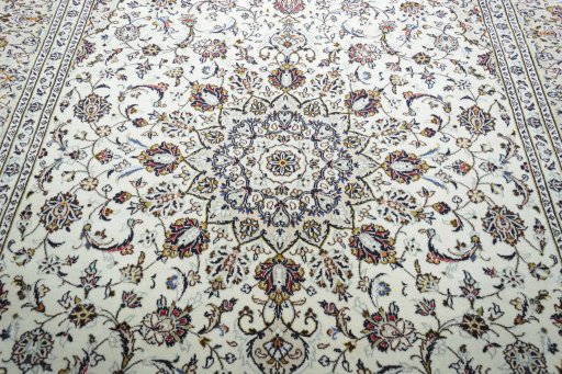Central medallion detail of 2000s Kashan rug from Iran / Persia