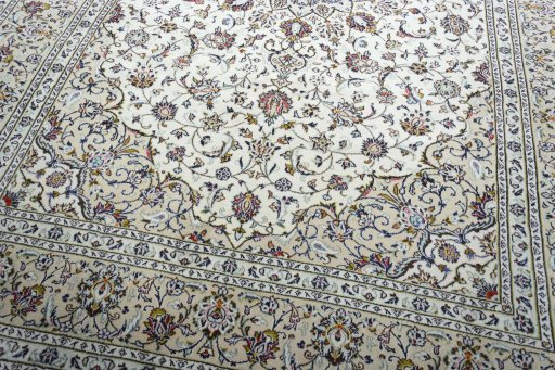 Close-up detail of 2000s Kashan rug from Iran / Persia showing Wool weave