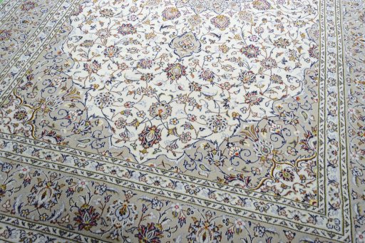 Close-up detail of 2000s Kashan rug from Iran / Persia showing Wool weave