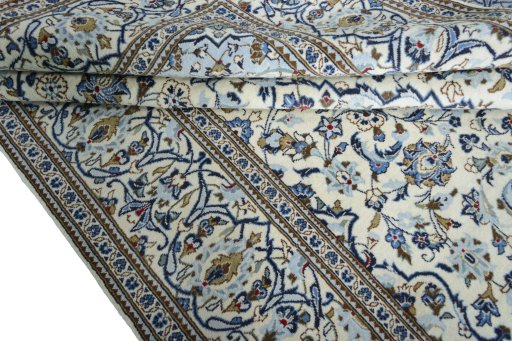 Close-up detail of 2000s Kashan rug from Iran / Persia showing Wool weave