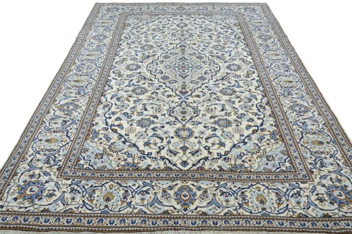 Surface texture of 2000s Kashan rug with natural Wool and intricate pattern