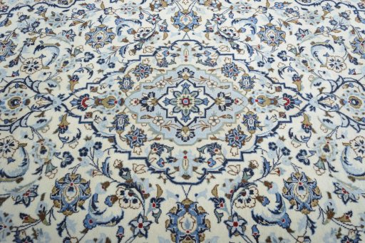Central medallion detail of 2000s Kashan rug from Iran / Persia