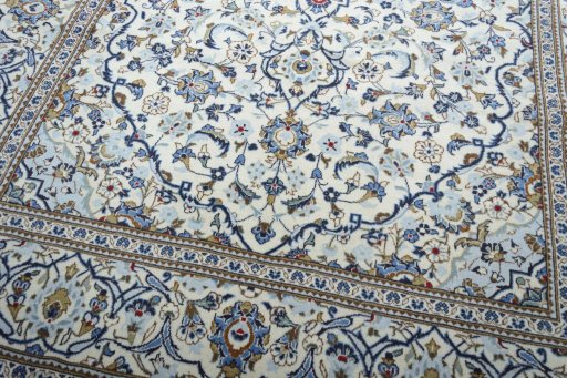 Close-up detail of 2000s Kashan rug from Iran / Persia showing Wool weave
