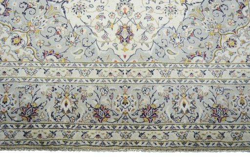 Full view of New Kashan rug from Iran / Persia, 303 × 207 cm in Beige tones