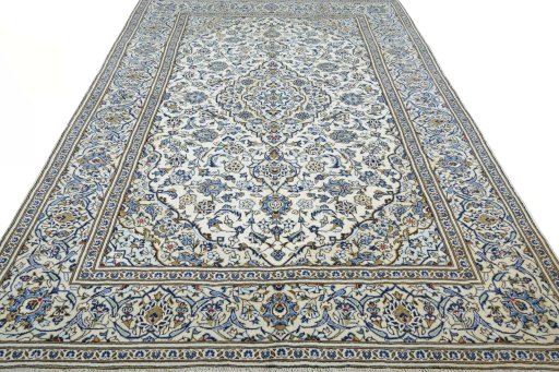 Surface texture of 2000s Kashan rug with natural Wool and intricate pattern