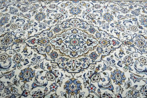 Central medallion detail of 2000s Kashan rug from Iran / Persia