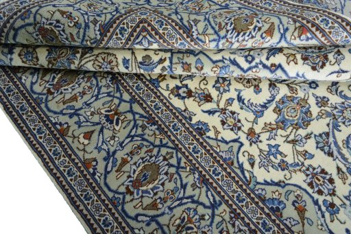 Close-up detail of 2000s Kashan rug from Iran / Persia showing Wool weave
