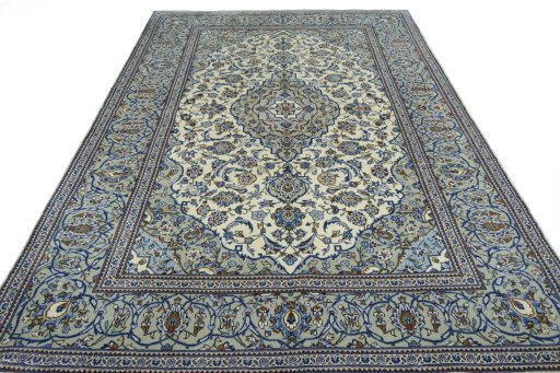 Surface texture of 2000s Kashan rug with natural Wool and intricate pattern