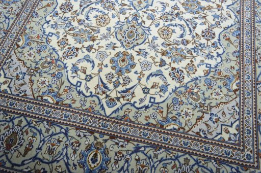 Close-up detail of 2000s Kashan rug from Iran / Persia showing Wool weave