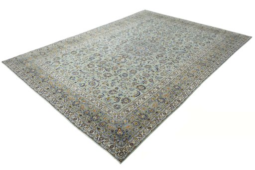 Corner detail of 2000s Kashan rug showing border pattern and Wool pile